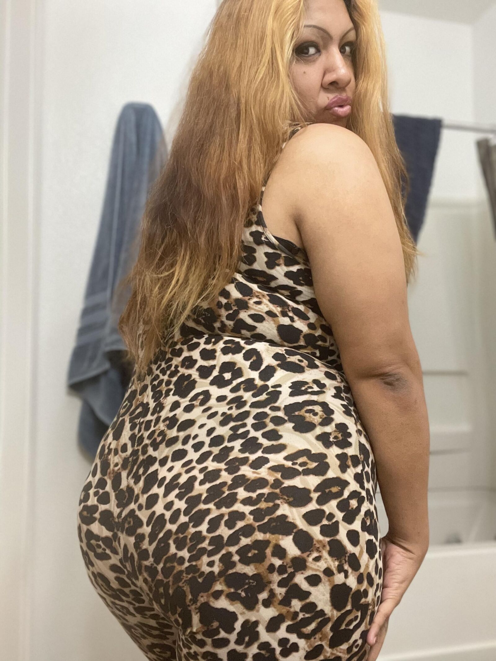 CHINA LOCA DRESSED UP IN A LEOPARD BODYSTOCKING 