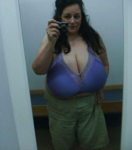 Many selfies of huge boobed mature