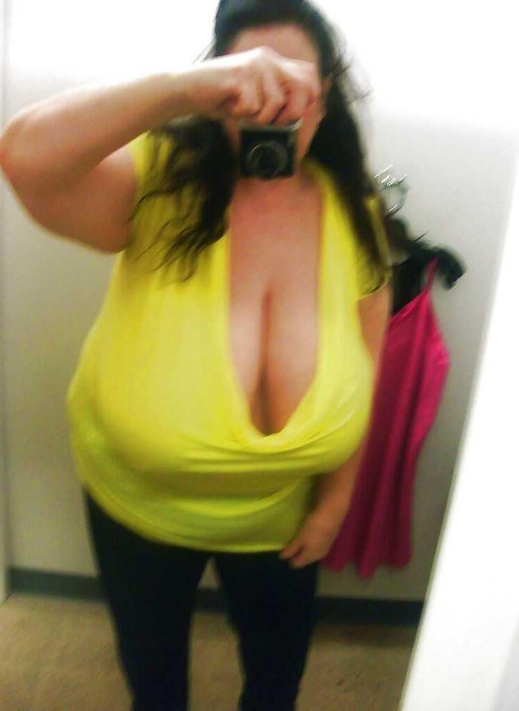 Many selfies of huge boobed mature