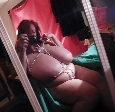 Many selfies of huge boobed mature