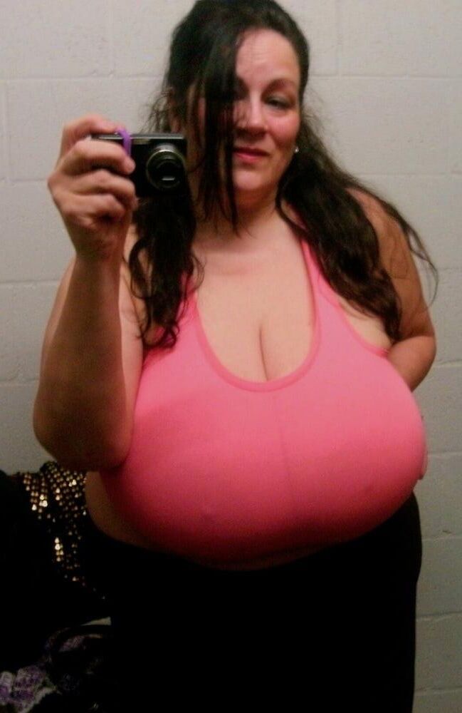 Many selfies of huge boobed mature