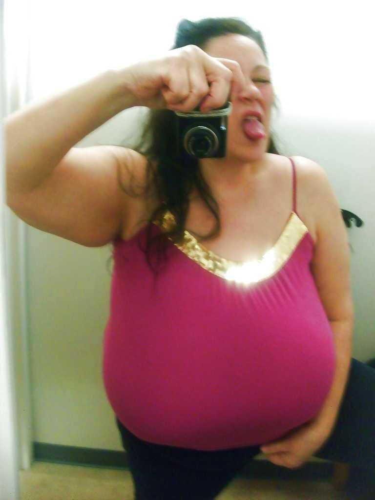 Many selfies of huge boobed mature