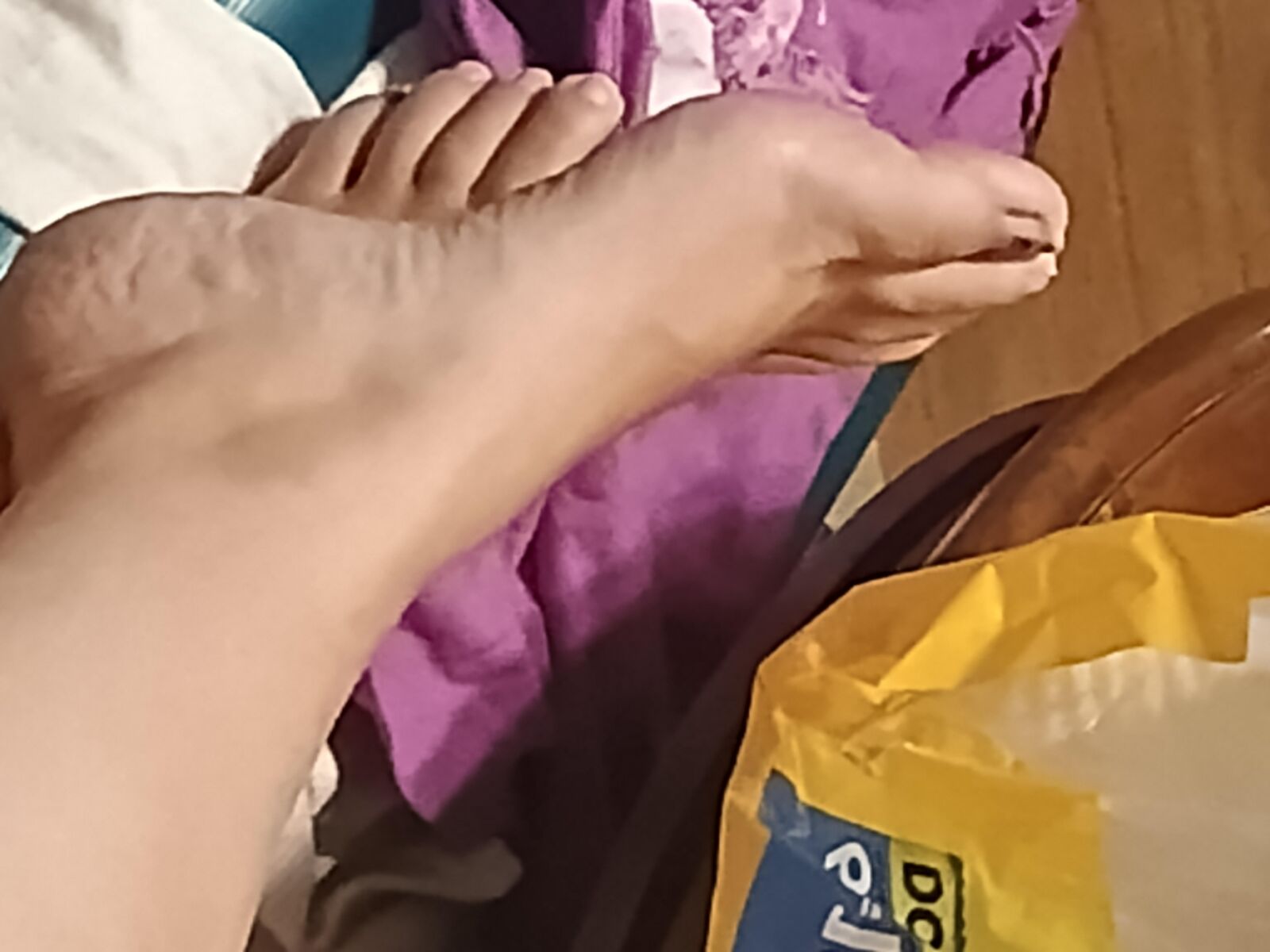 My wife's candid soles and legs