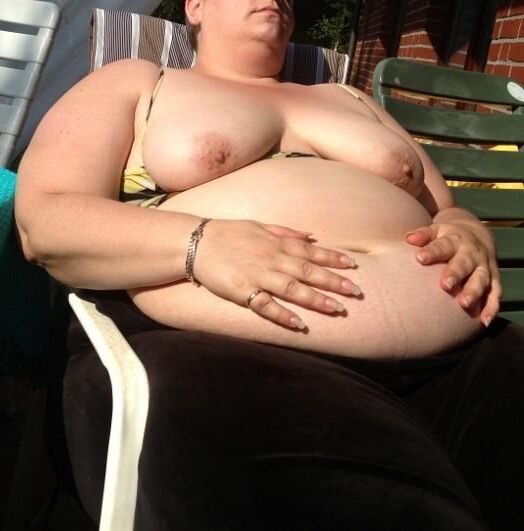 Fat KG german MILF flashes anging tits and belly in the sun