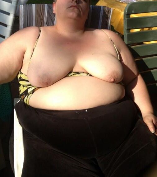 Fat KG german MILF flashes anging tits and belly in the sun