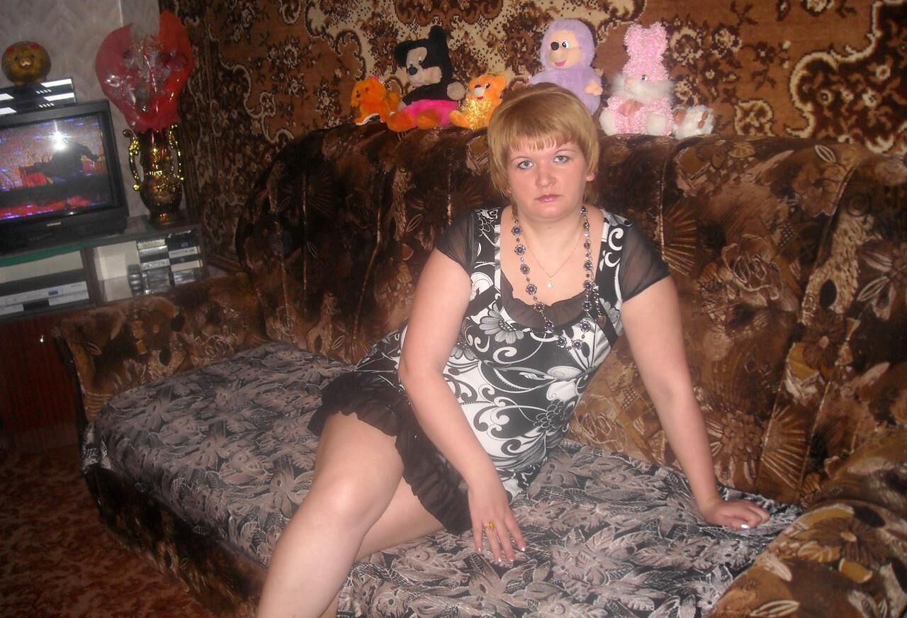 . Women fully dressed. No nudity