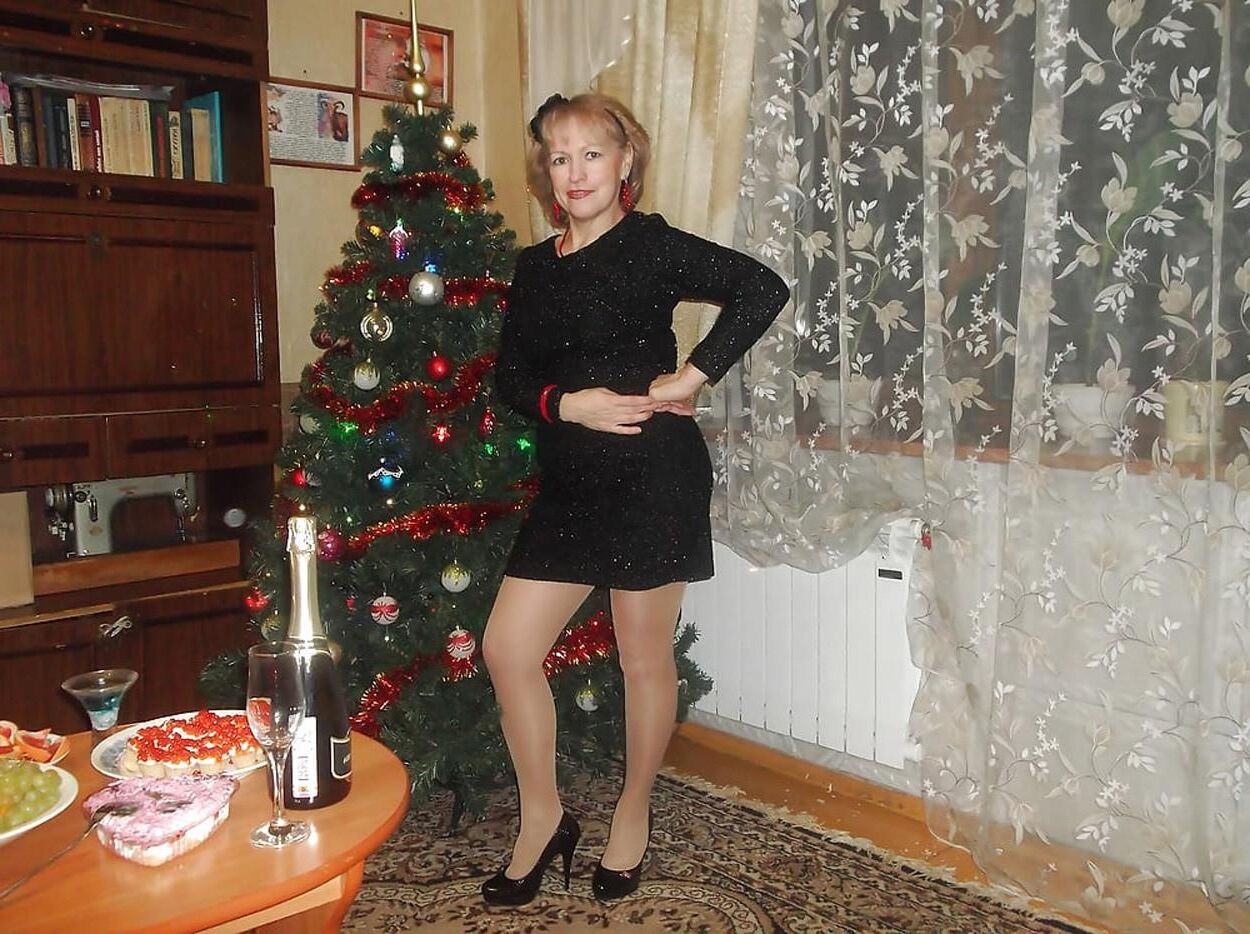 . Women fully dressed. No nudity