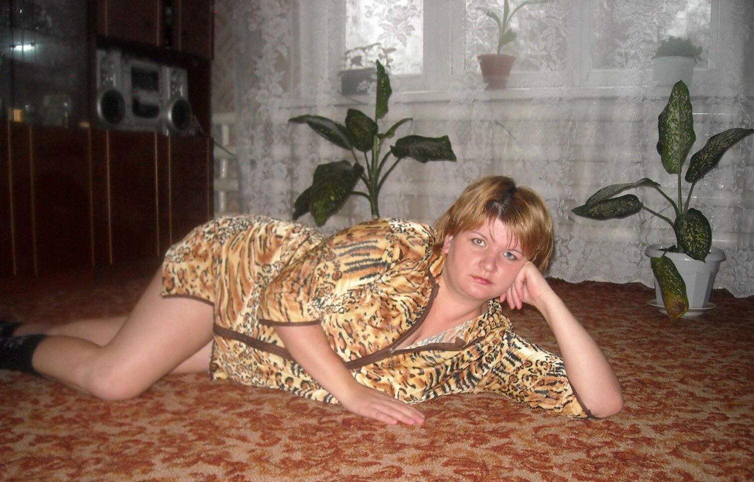 . Women fully dressed. No nudity