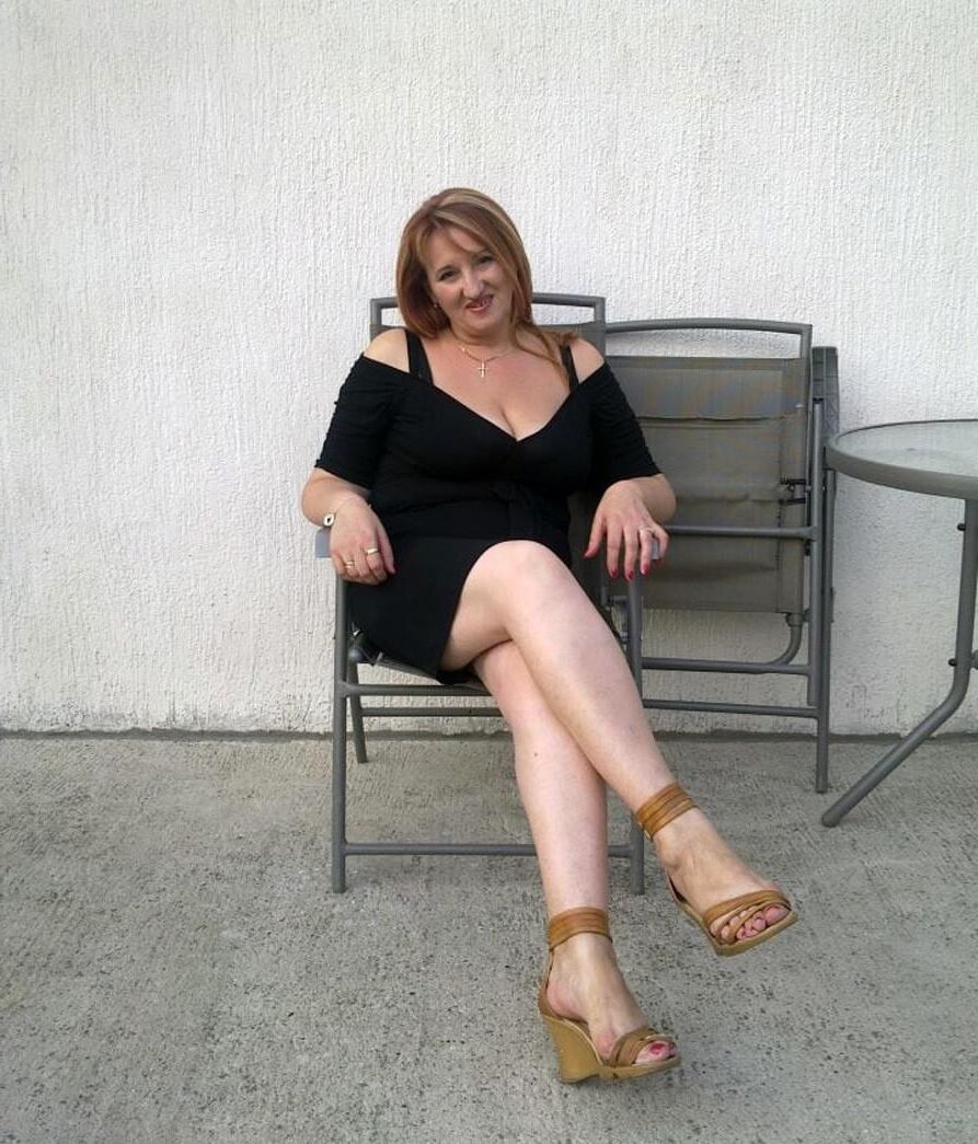 . Women fully dressed. No nudity
