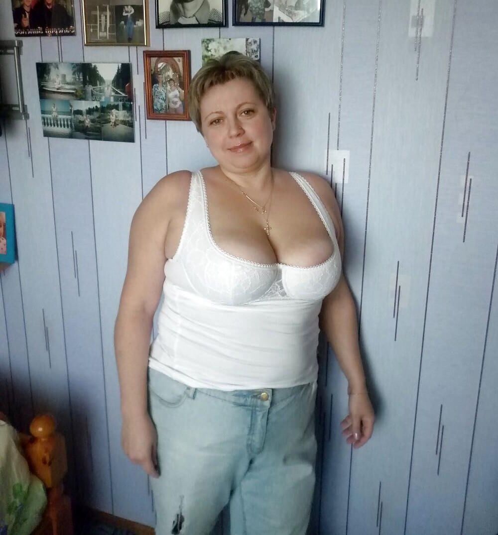 . Women fully dressed. No nudity