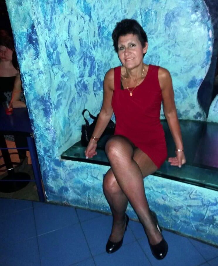 . Women fully dressed, no nudity