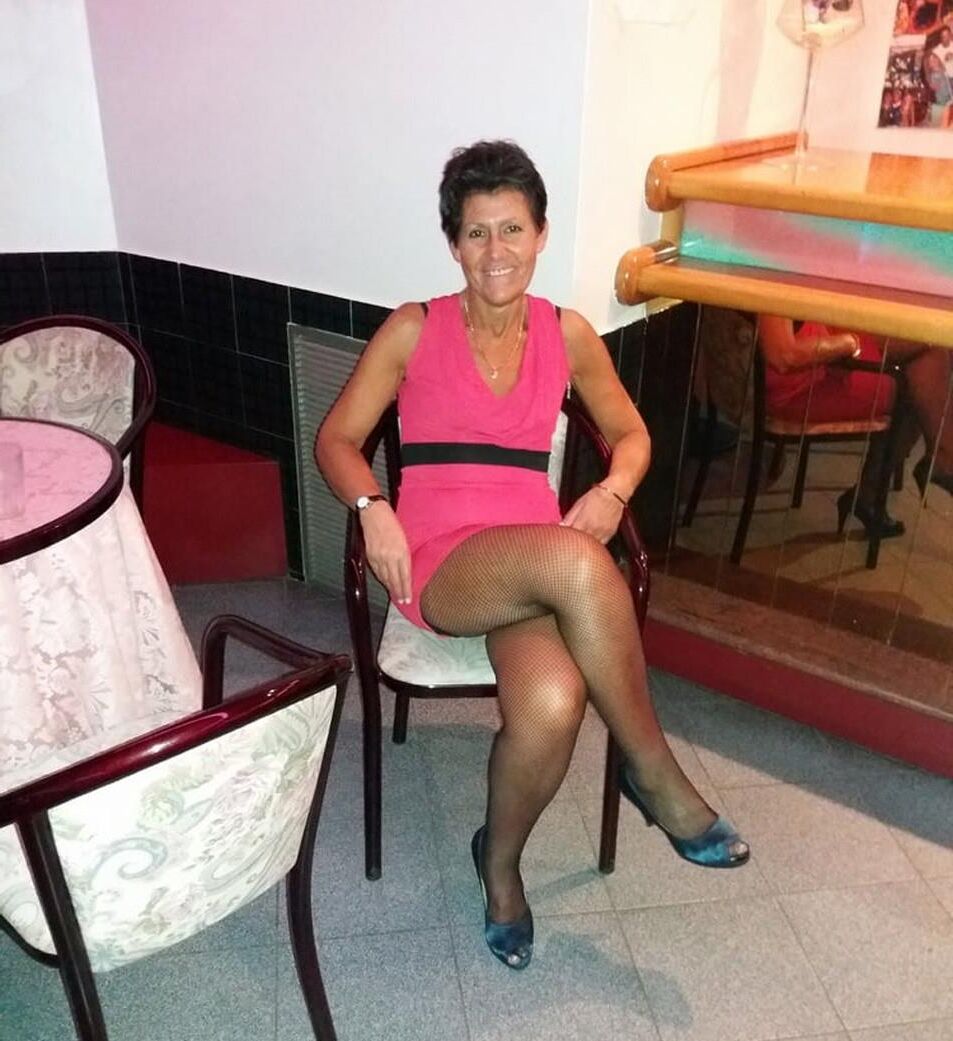 . Women fully dressed, no nudity