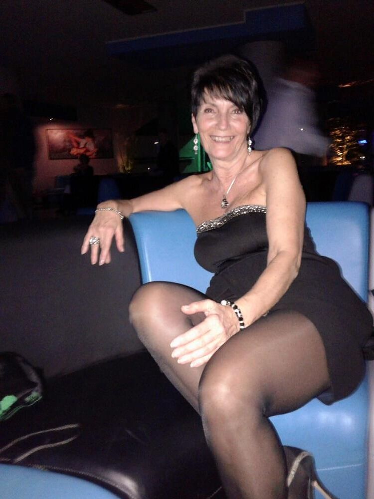 . Women fully dressed, no nudity