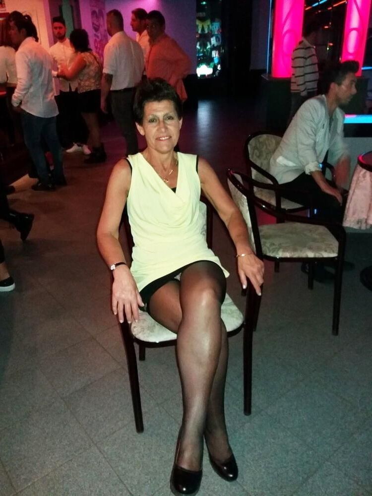 . Women fully dressed, no nudity