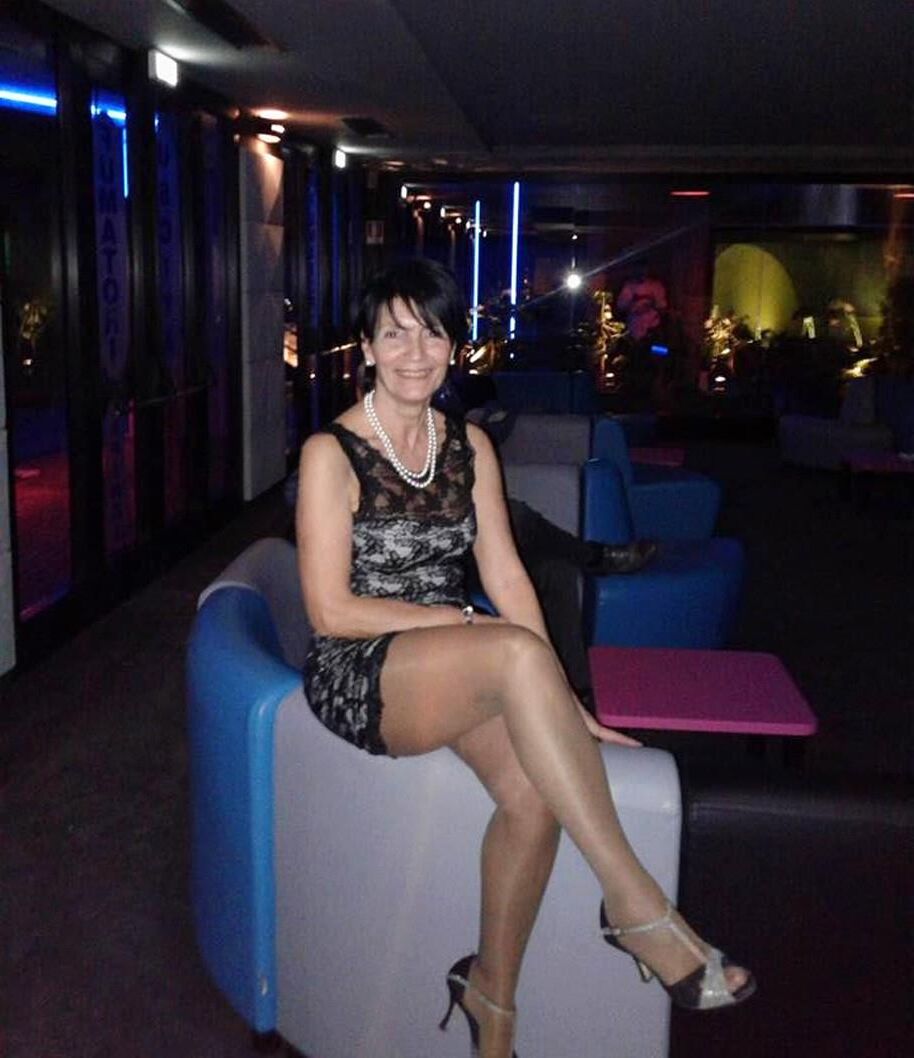 . Women fully dressed, no nudity