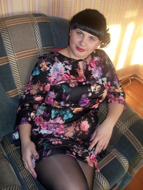 . Women fully dressed, no nudity