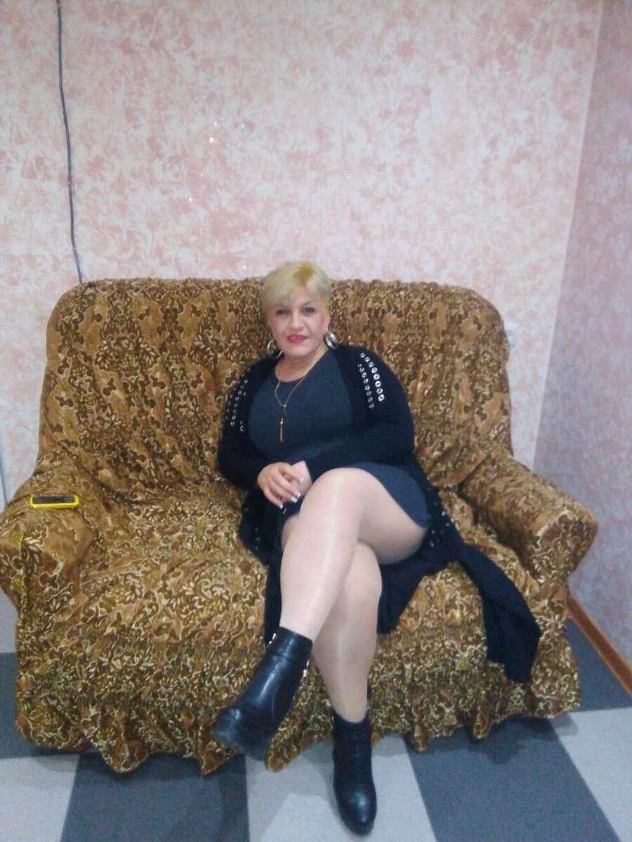 . Women fully dressed, no nudity