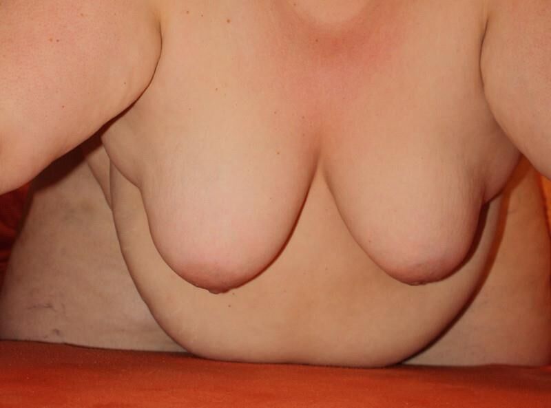 Fat KG SSBBW fatty shows haning tits and belly