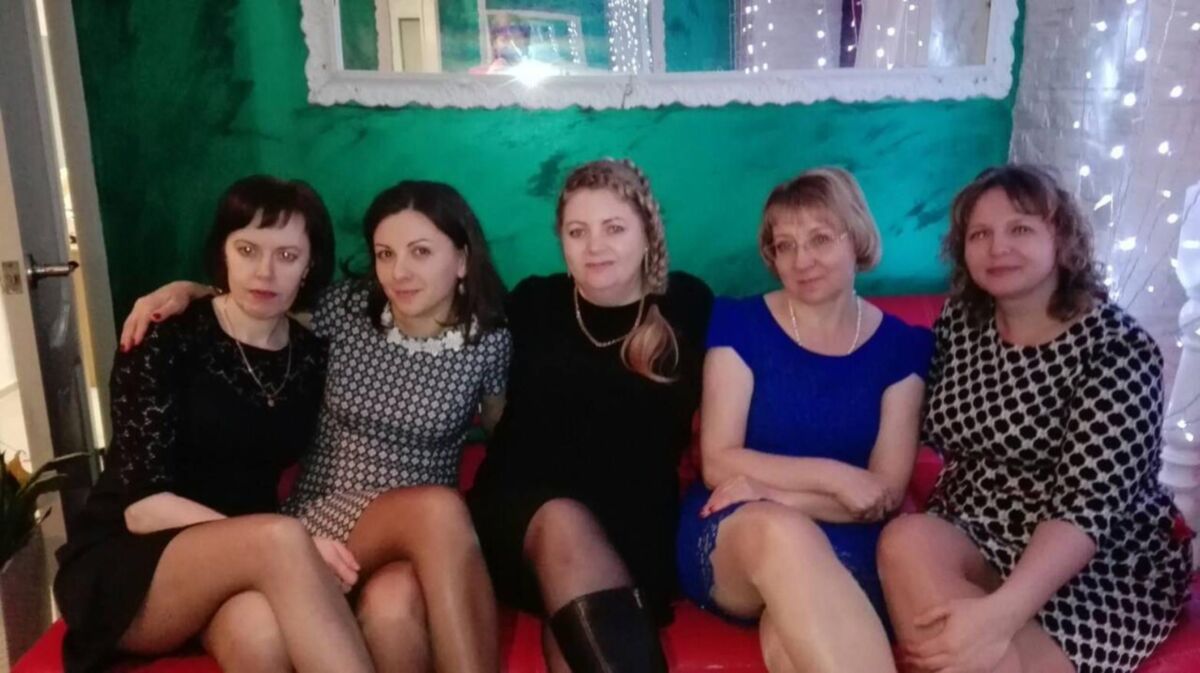 . Fully dressed women, no nudity