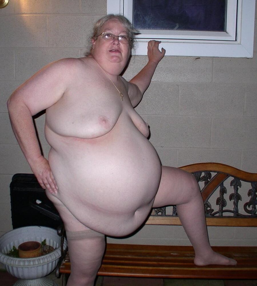 Loira madura grande barriga