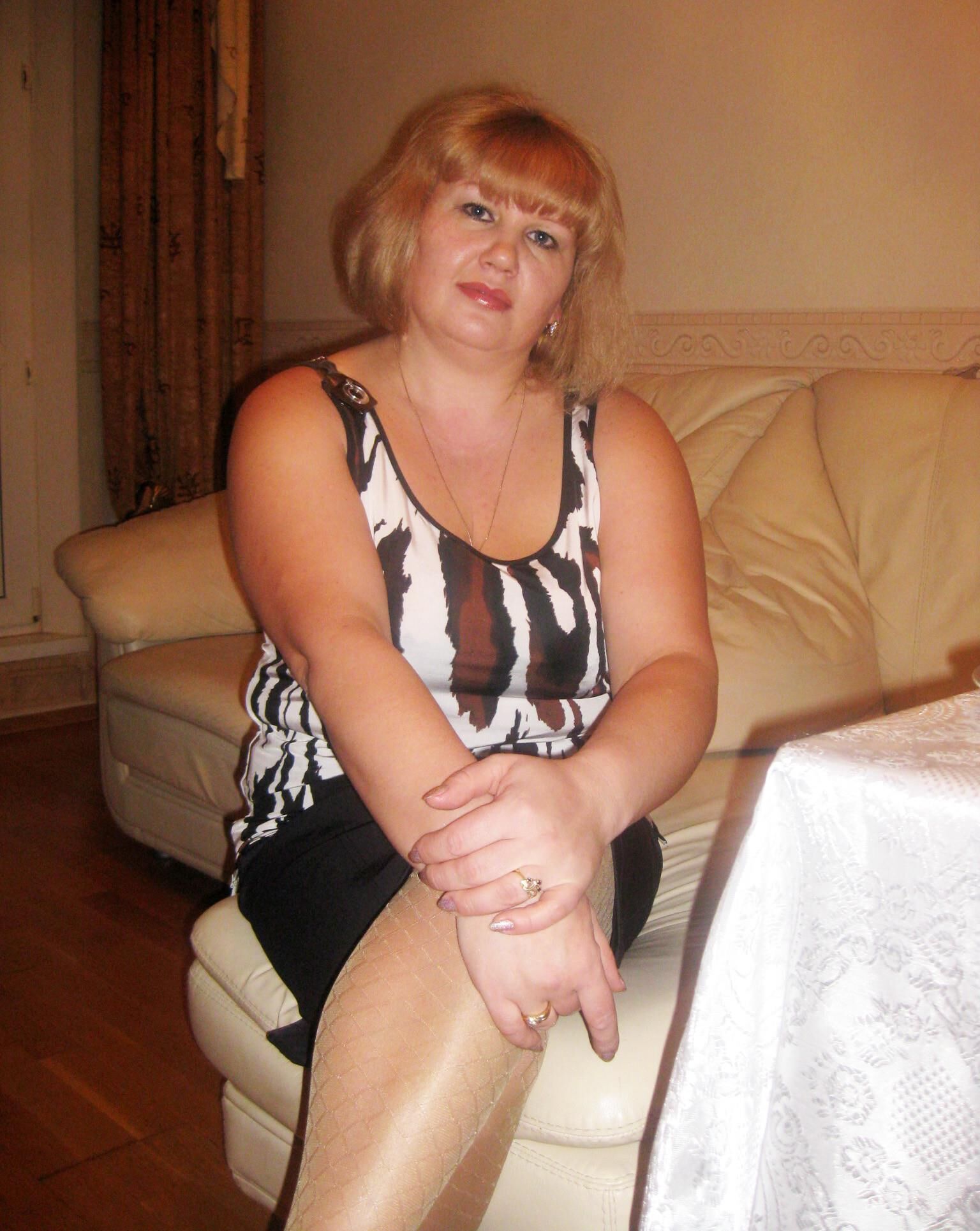 . Women fully dressed, no nudity