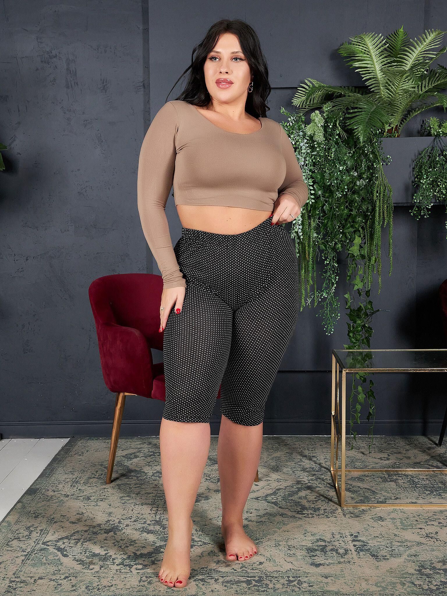 . Women fully dressed, no nudes