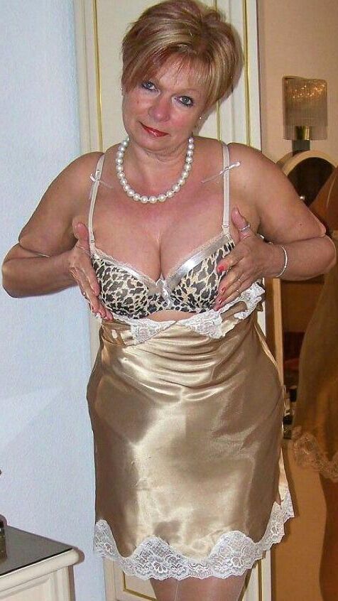 . Women fully dressed, no nudes