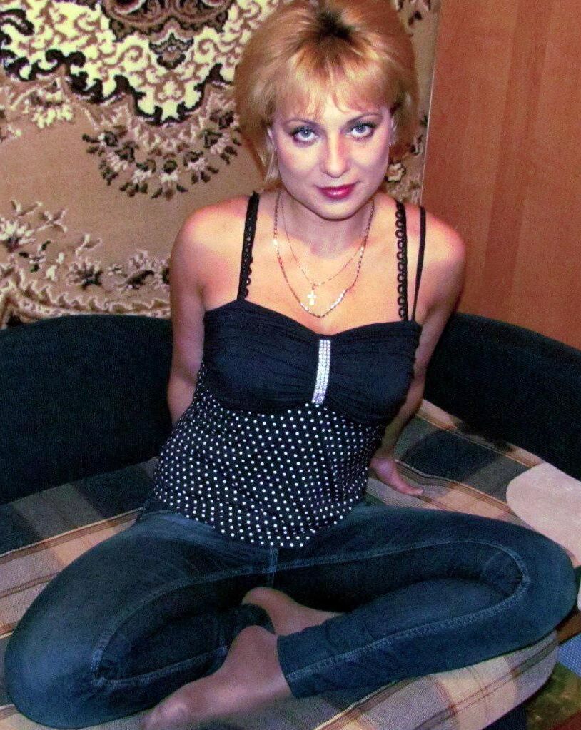 . Women fully dressed, no nudity