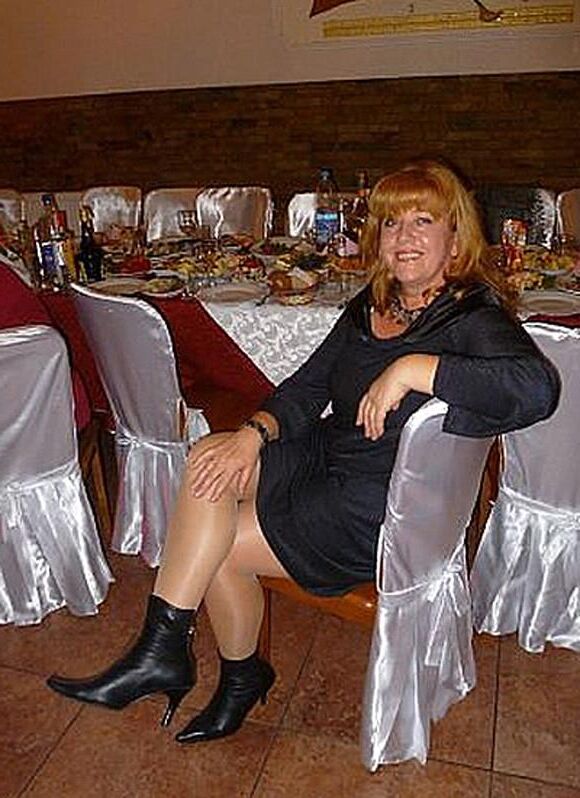 . Women fully dressed, no nudity