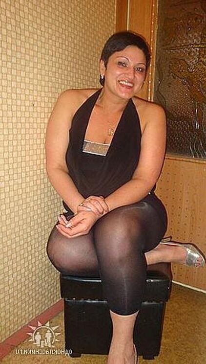 . Women fully dressed, no nudity
