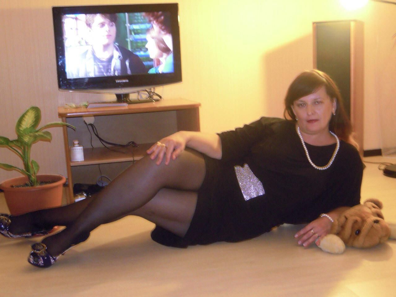 . Women fully dressed, no nudity