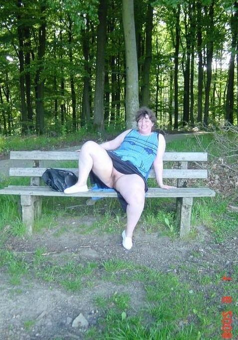 BBW mature in blue dress outdoors